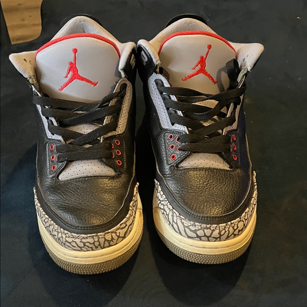Jordan Black Leather Sneakers with Red and Gray Accents